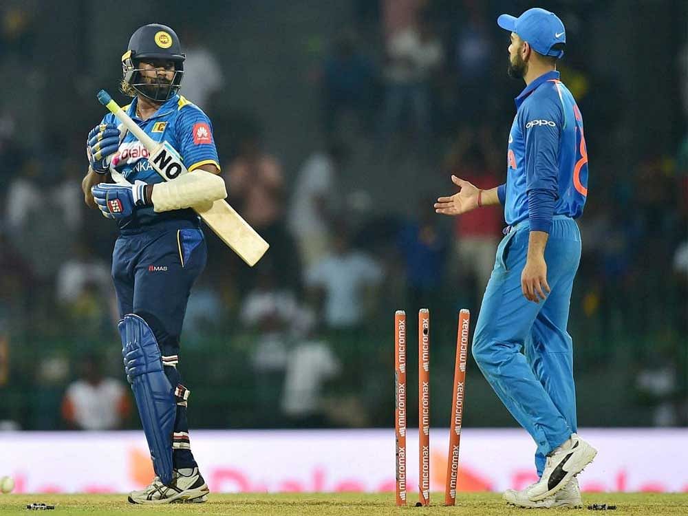 Sri Lanka's Lasith Malinga greets India's Virat Kohli after win the match during the 4th ODI match in Colombo, Sri Lanka, on Thursday. PTI Photo