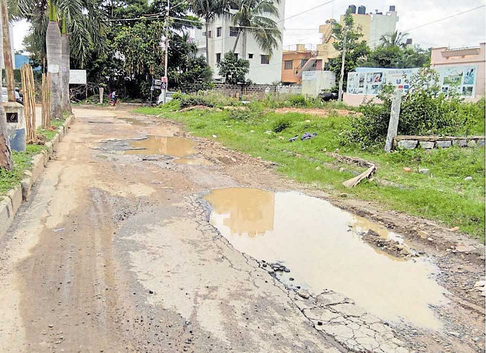 The main road in Classic Paradise Layout, Begur, was dug up in October 2016 to lay drainage pipes to the nearby DLF Newtown apartments in Akshaya Nagar.