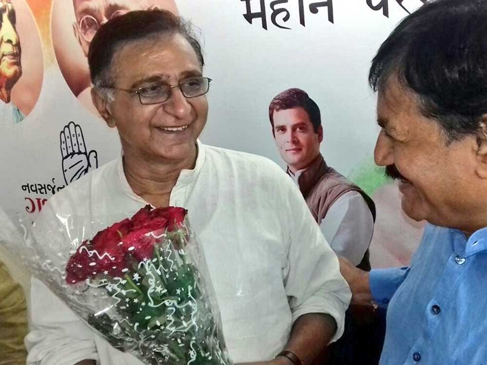 In picture: Deepak Babaria, a senior Gujarat leader and Rahul Gandhi confidant and the new AICC General Secretary in-charge of Madhya Pradesh being greeted by Bharat Solanki, President of Gujarat Pradesh Congress Committee (  INC Gujarat ), Former Union Minister, Government of India. Photo via Twitter. Representational Image.