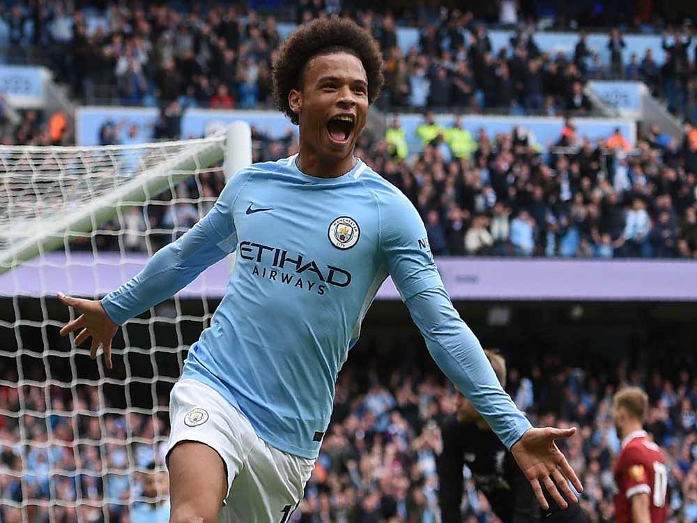 HIGH FLYING: Manchester City's Leroy Sane celebrates after scoring against Liverpool on Saturday. AFP