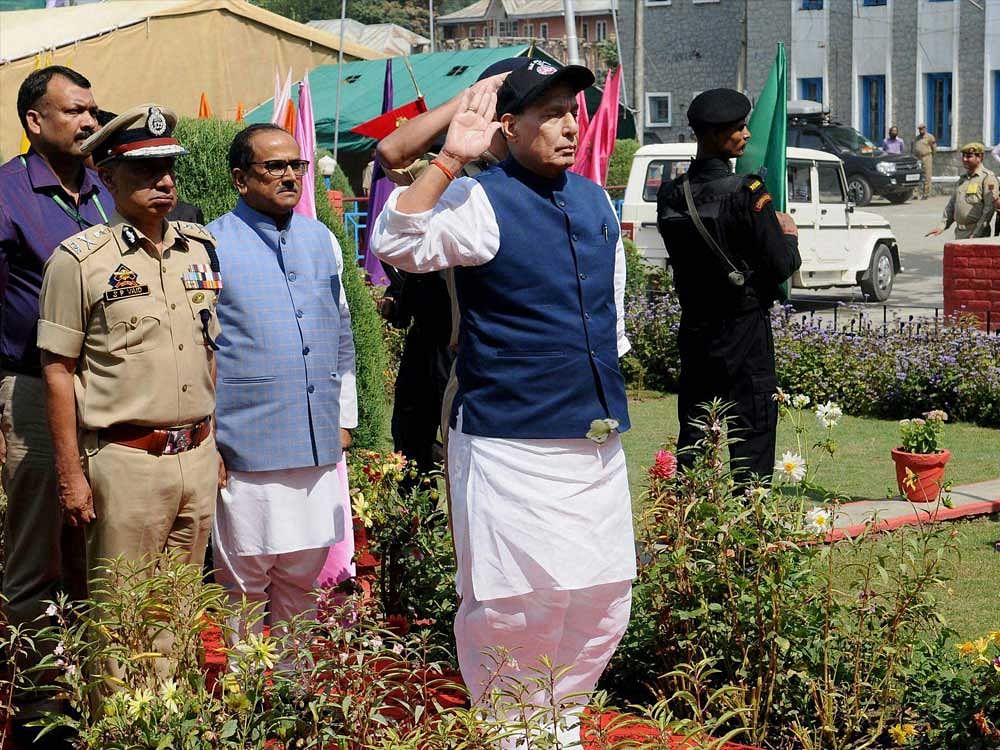 : Home Minister Rajnath Singh taking the salute of the Guard of Honour, during his visit to Jammu and Kashmir Police Lines, in Anantnag on Sunday. Deputy Chief Minister of Jammu and Kashmir Nirmal Kumar Singh and DGP, J&K, Dr. S.P. Vaid are also seen. PTI Photo/PIB Representational image.