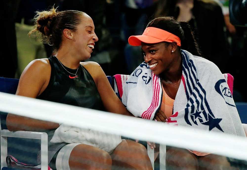 Strong bond: Best friends Sloane Stephens (right) and Madison Keys have a laugh after the final of the US Open. Reuters