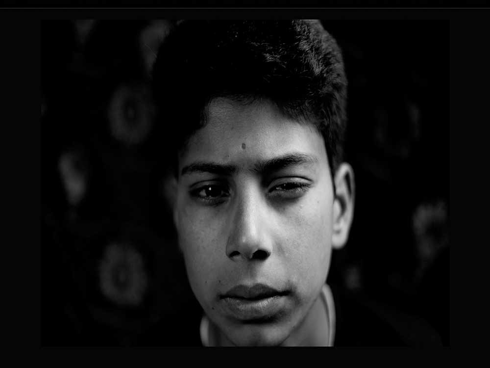 Umair Hammed Ganie (pictured above) said 'My memory isn't so good anymore and I have nightmares. I can't even go out and play in the sun.' Photo credit: Amnesty International India.