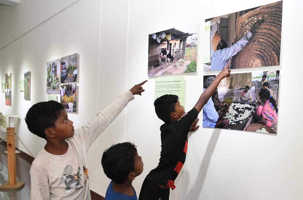 A photo exhibition about agriculture in peri-urban Bengaluru organised by Azim Premji University at Rangoli Metro Art Center on Friday. dh photo
