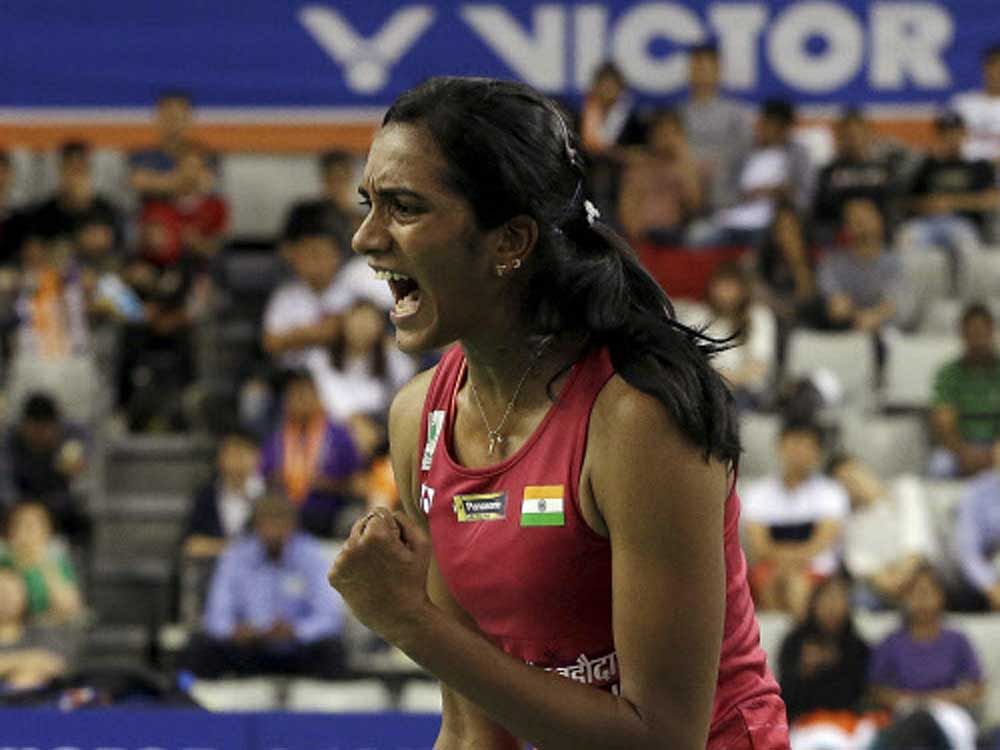 India's Pusarla V. Sindhu shouts after scoring a point against Japan's Nozomi Okuhara during women's single final match at the Korea Open Badminton in Seoul, South Korea. AP/PTI Photo