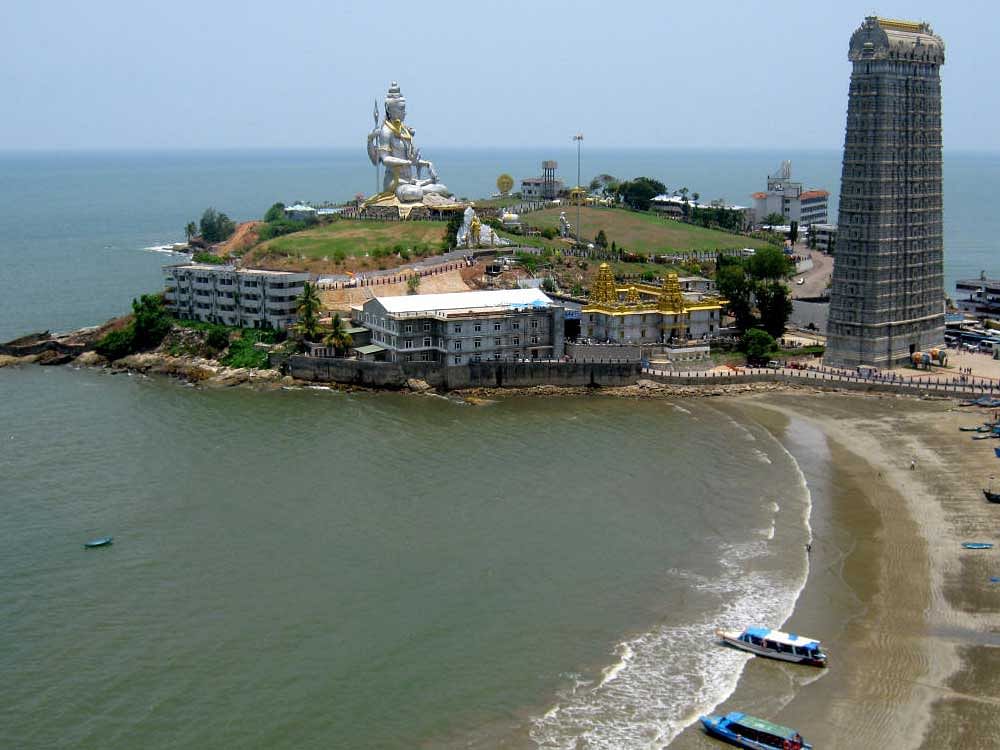 A view of the beach and hillock at Murudeshwar, a town located in Uttara Kannada district.