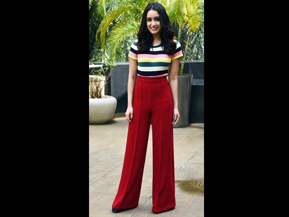 Indian Bollywood actress Shraddha Kapoor poses for a photograph during a promotional event for the forthcoming Hindi film 'Haseena Parkar' in Mumbai on September 16, 2017. / AFP PHOTO / STR