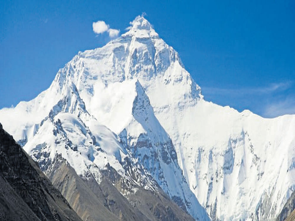 In 2005, Chinese team concluded that the height of the Everest is 8,844 metres on the basis of the rock without taking into account the snow covering the mountain peak. However, Nepal government has taken the snow as the basis for measuring the height. File photo.