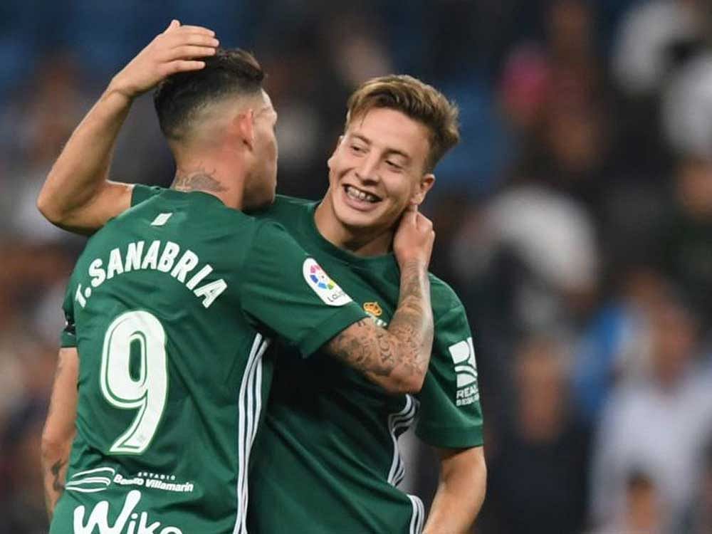 Real Betis' Antonio Sanabria (left) celebrates his goal with team-mate Francis Guerrero. AFP