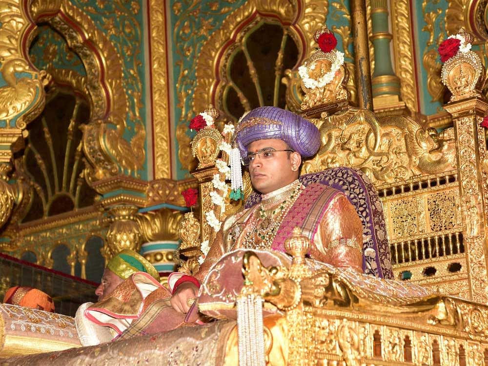 Yaduveer Krishnadatta Chamaraja Wadiyar, member of erstwhile royal family conducts private durbar (Khasagi durbar) seated on the golden throne, at Mysuru Palace, on Thursday.