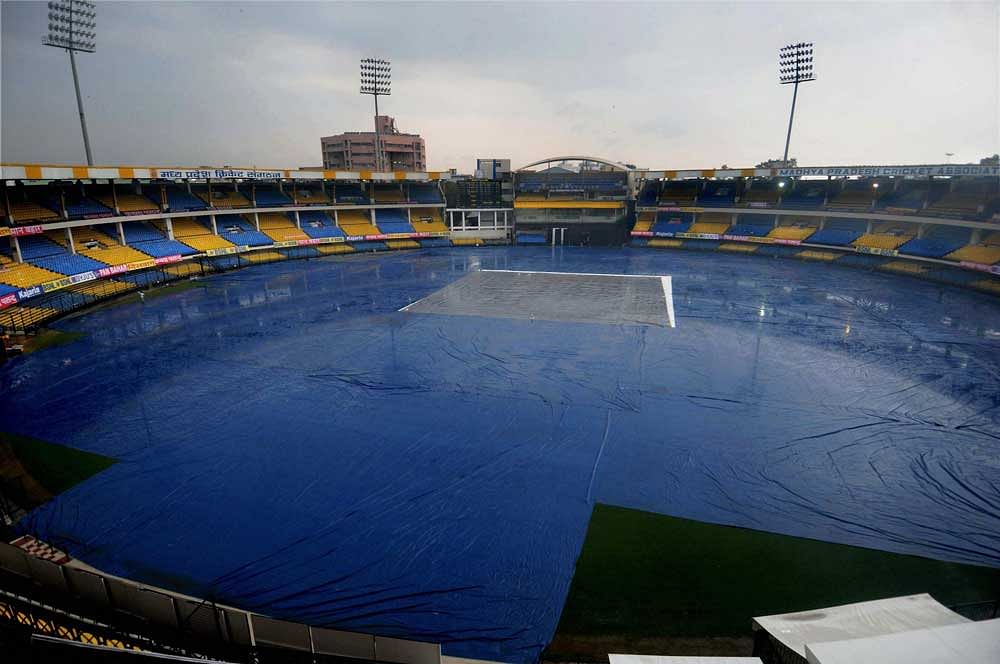 File photo of the Holkar Stadium as it is covered in plastic to prevent rain damage to the pitch. PTI file photo.