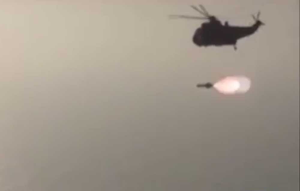 Screengrab from video released by the Pakistani Defence forces, showing a missile being dropped from a helicopter. Twitter.