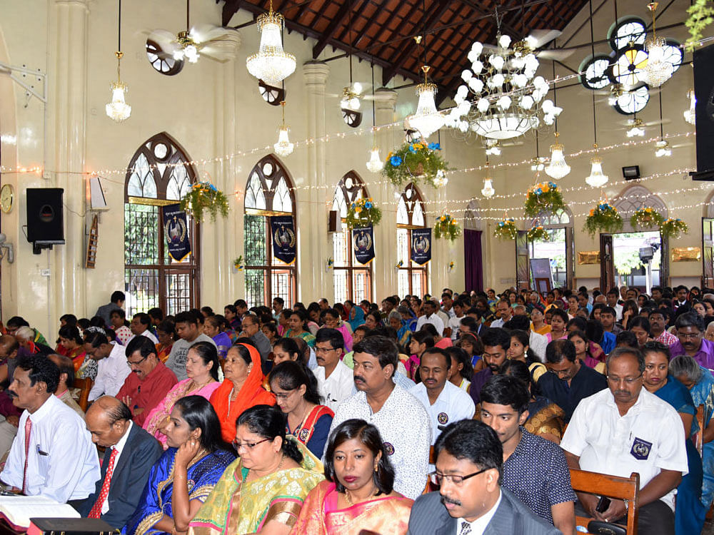 People participate at the 113th anniversary celebrations of Hudson Memorial Church at Hudson circle in Bengaluru on Sunday. DH Photo