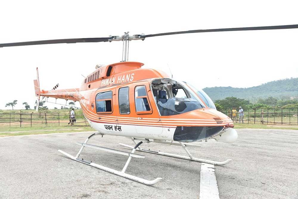 The Pawan Hans helicopter that was damaged after a bird hit during a joy ride in Mysuru on Sunday. DH Photo.