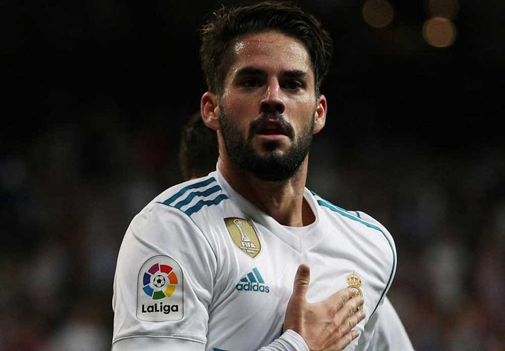 Magician: Real Madrid's Isco celebrates after scoring his second goal against Espanyol on Sunday. Reuters