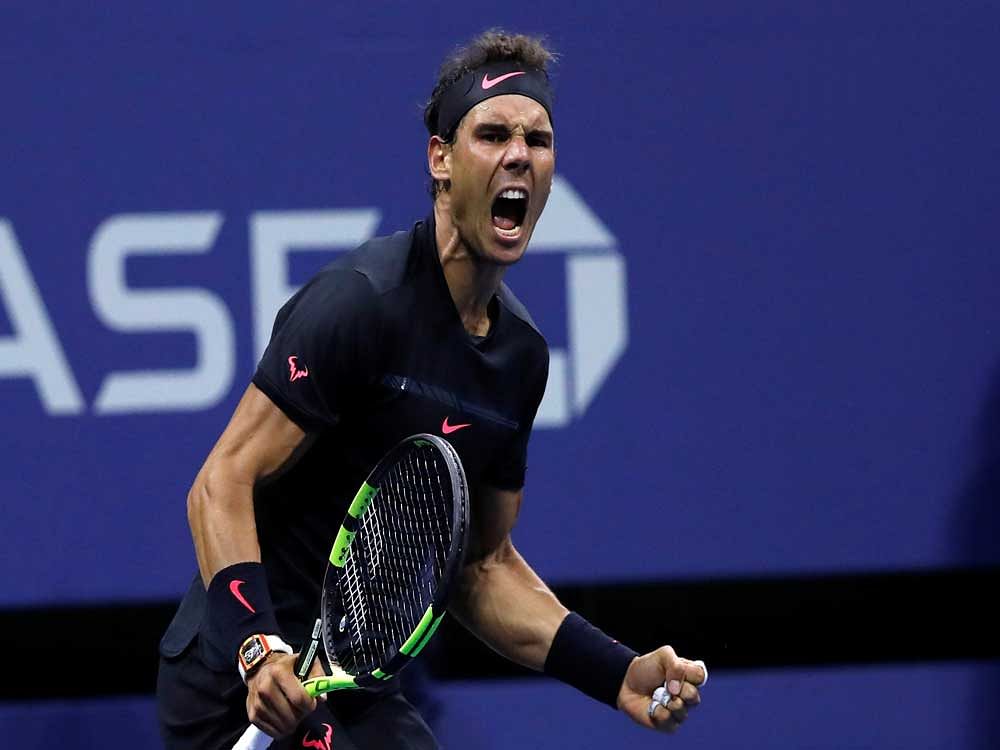 The 16-time Grand Slam champion Nadal saw off the young Russian Karen Khachanov 6-3, 6-3 to set up a last-eight clash with Isner in Beijing. Reuters file photo.