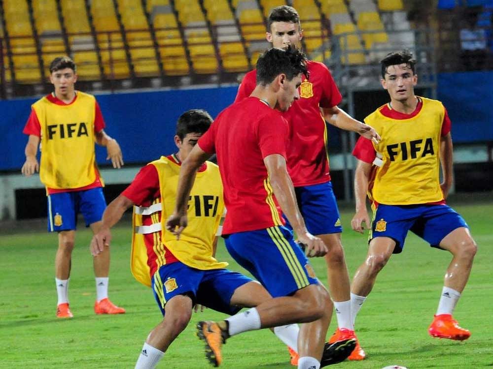 GEARING UP Spanish players during a training session ahead of their match against Brazil. PTI