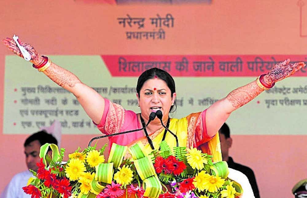 Union I&B Minister Smriti Irani speaks at a public meeting for the launch of several developmental schemes in Gauriganj, Amethi on Tuesday. PTI