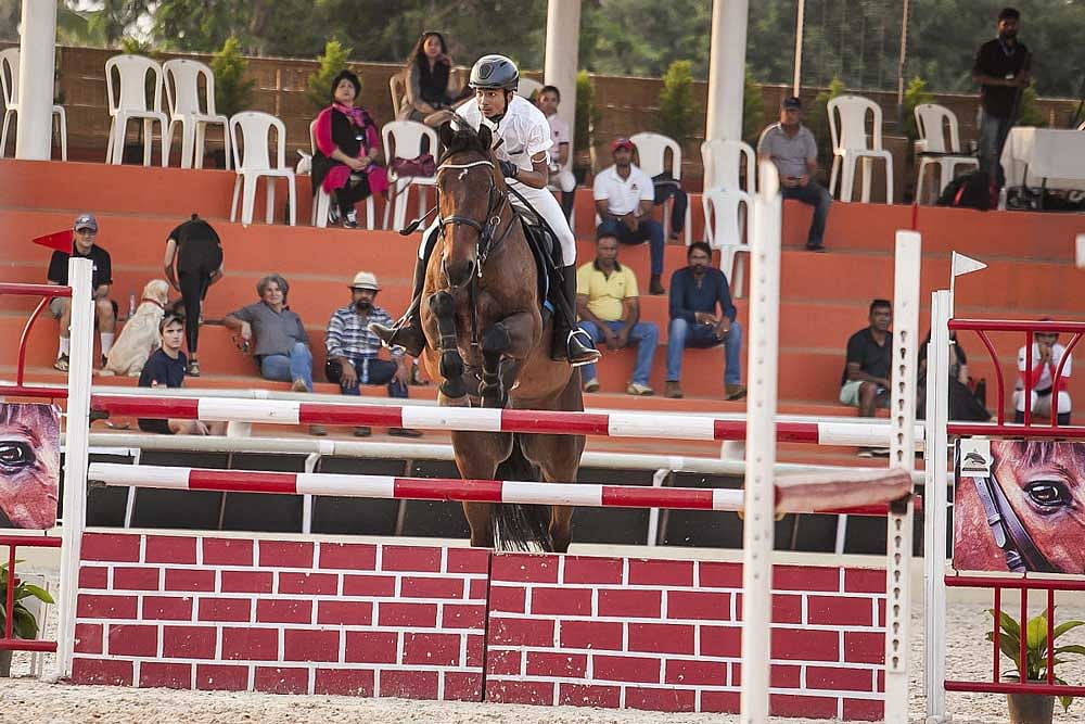 Anirudh Krishna of ECE, riding Olgy, en route to his win in the 120-130cm category at the Equestrian Premier League.
