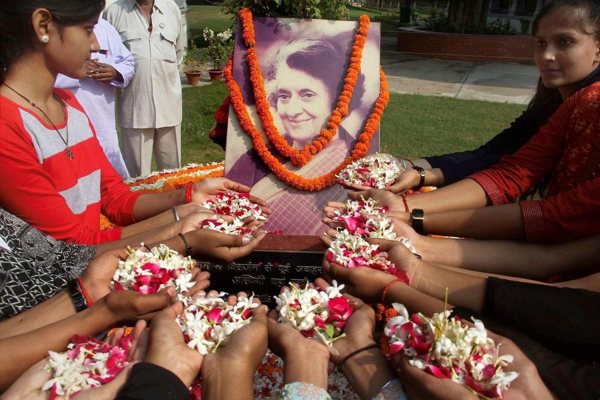 School children pay floral tribute to former Prime Minister the late Indira Gandhi on her 33rd death anniversary at historical Anand Bhawan in Allahabad on Tuesday. PTI Photo