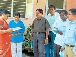 So it begins: The first phase of the house listing for census 2011 began from District Superintendent of Police Dr K Tyagarajans house in Kolar on Thursday. Tyagarajans wife Sangeetha gave all the details. Assistant Commissioner R S Peddappaiah, enumerators Lakshmikanthamma, Narasimharaju and Gopal Malgatti are seen. DH Photo
