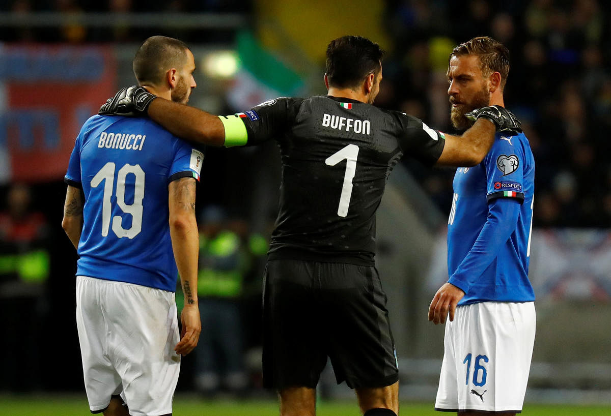 BACKS TO THE WALL (From left) Italy's star trio of Leonardo Bonucci, Gianluigi Buffon and Daniele De Rossi will need to put a vintage display on Monday if they are to beat Sweden and secure passage to the World Cup. REUTERS