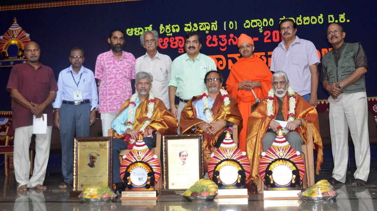 Prakash Shetty was conferred "Vyangyachitrasiri," Ramesh Rao with "Chitrasiri" and Dr O P Prakash Shetty with "Chayachitrasiri" award by Alva's Education Foundation, in Moodbidri on Sunday.