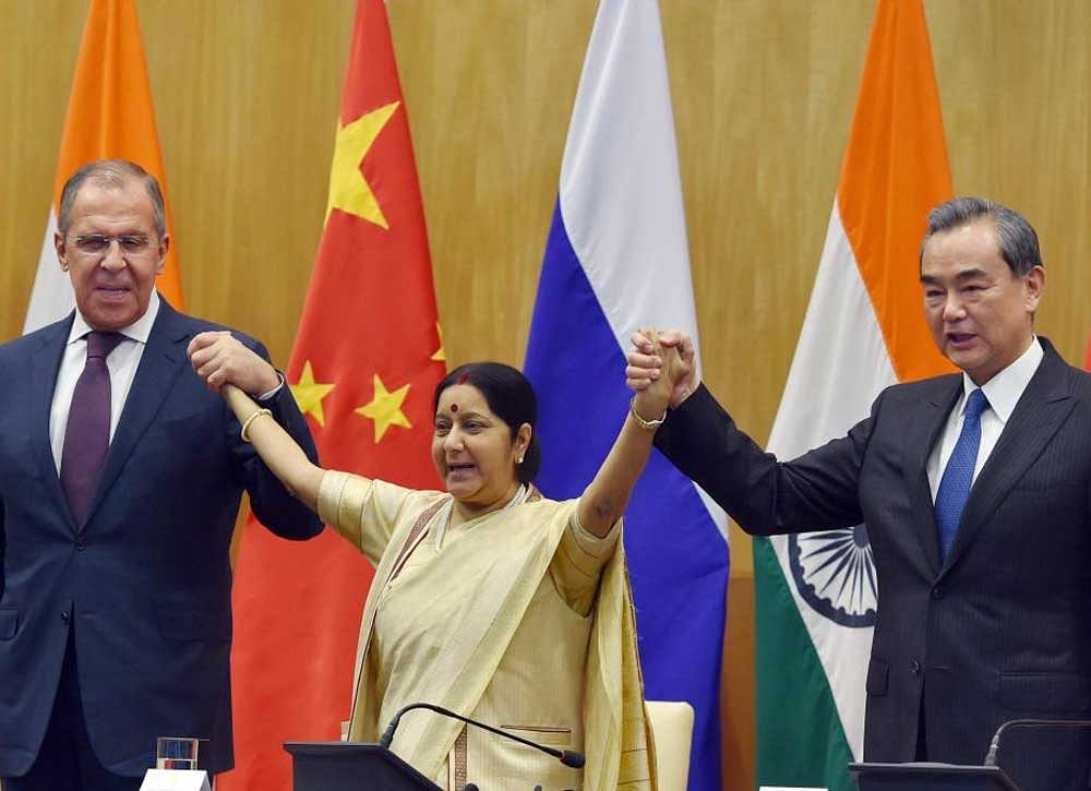 Sushma Swaraj with her Chinese counterpart Wang Yi and Russian Foreign Minister Sergey Lavrov at a joint press conference following the Russia-India-China Foreign Ministerial Meeting at Jawahar Lal Nehru Bhawan in New Delhi. PTI Photo