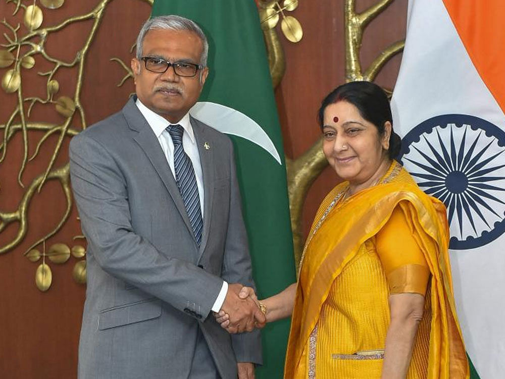 External Affairs Minister Sushma Swaraj greets Mohamed Asim, Minister of Foreign Affairs & Special Envoy of the President of the Republic of Maldives, ahead of a meeting, in New Delhi on Thursday. PTI