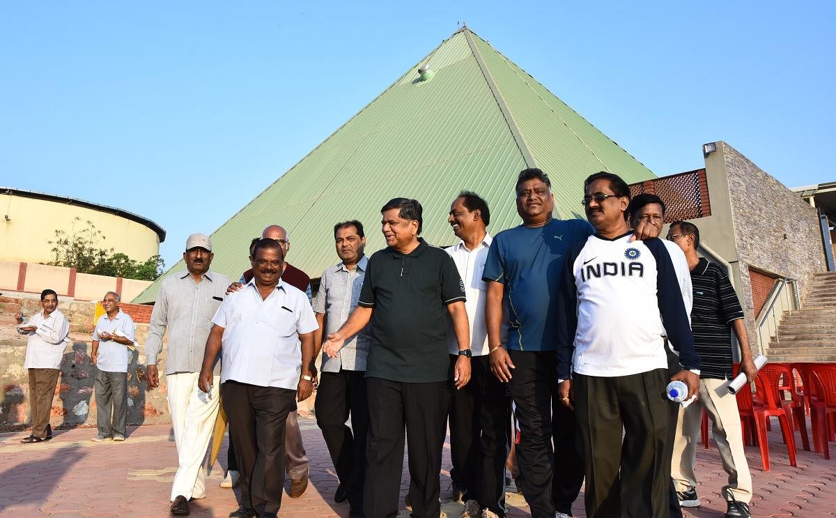 Leader of Opposition in Legislative Assembly Jagadish Shettar and others visit the meditation pyramid near Nrupatunga Betta in Hubballi on Saturday.