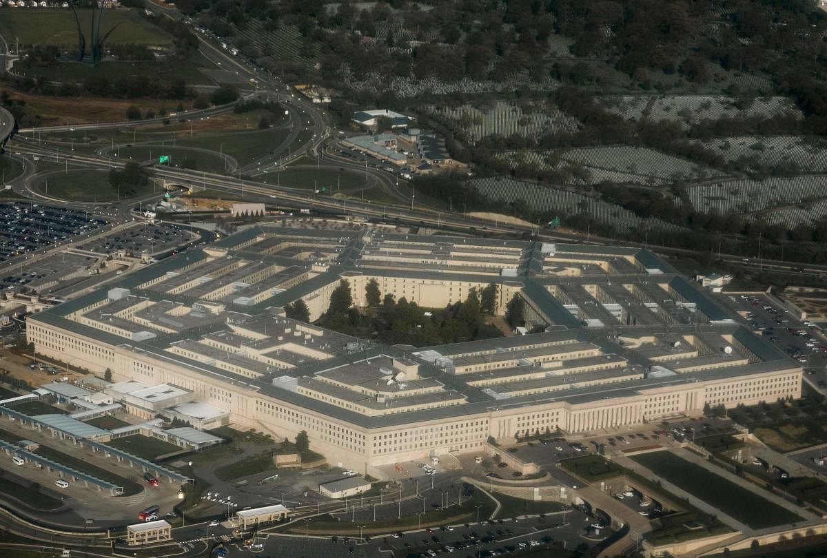 (FILES) This file photo taken on April 23, 2015 shows the Pentagon in Arlington, Virginia outside Washington, DC in this aerial photograph. The Pentagon on December 7, 2017 warned of possible weapons delays and other military ramifications if the government shuts down over a budget deal impasse or passes a stop-gap spending bill to avert it. The US government is facing the looming prospect of shutting down as Republicans and Democrats wrangle over federal spending. / AFP PHOTO / SAUL LOEB