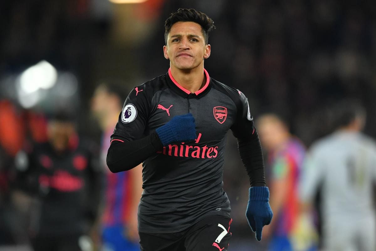 TARGET MAN Manchester United are all set to sign Arsenal's Alexis Sanchez in a deal that would make him the Premier League's highest paid player. AFP