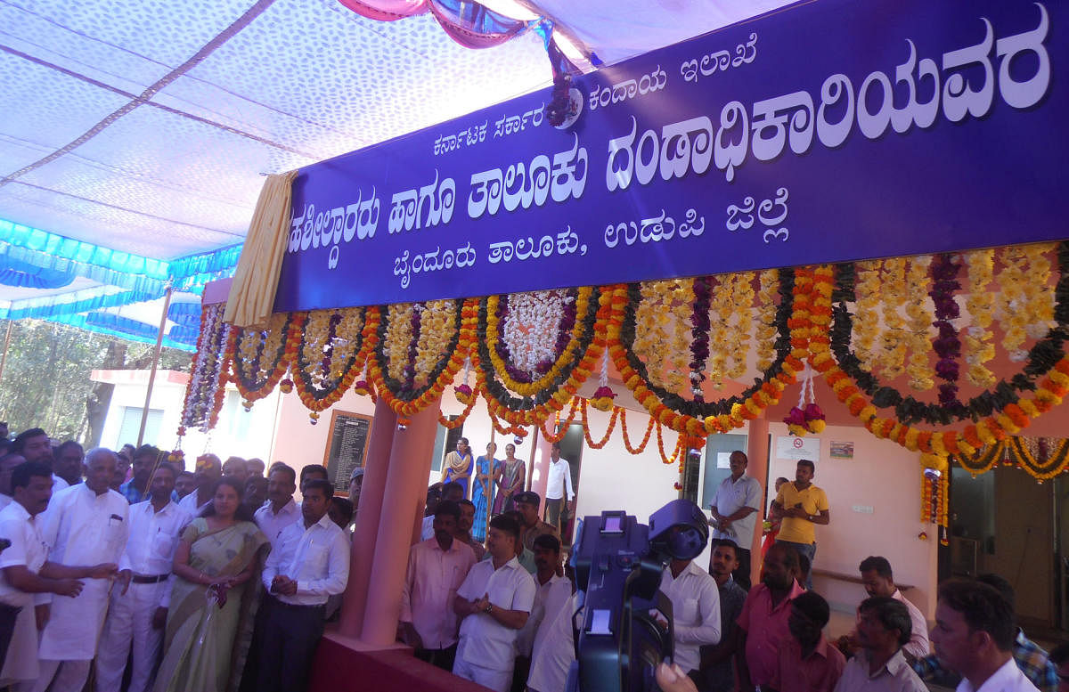 Revenue minister Kagodu Thimmappa inaugurates the tahsildar and taluk magistrate's office at Byndoor on Wednesday.