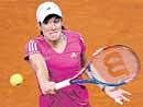 Belgiums Justine Henin returns to Julia Goerges during their first-round match at the Stuttgart Open. AFP