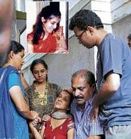 inconsolable: Grieving relatives of  Rajani Rajan (inset) murdered in Ganganagar on Friday.  dh photo