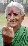 Eighty-five-year-old Pillamma cast  her vote at Halappanahalli in Hoskote on Saturday. DH Photo