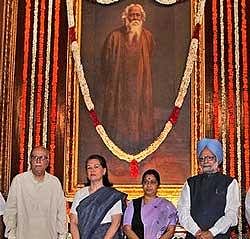 Prime Minister Manmohan Singh , Leader of Opposition in Lok Sabha Sushma Swaraj, UPA Chairperson Sonia Gandhi and senior BJP leader L. K. Advani after paying tributes to Rabindranath Tagore on his birth anniversary at Parliament House in New Delhi on Sunday. PTI