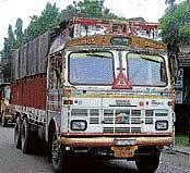 A truck owner has to pay Rs 20,000 annually.