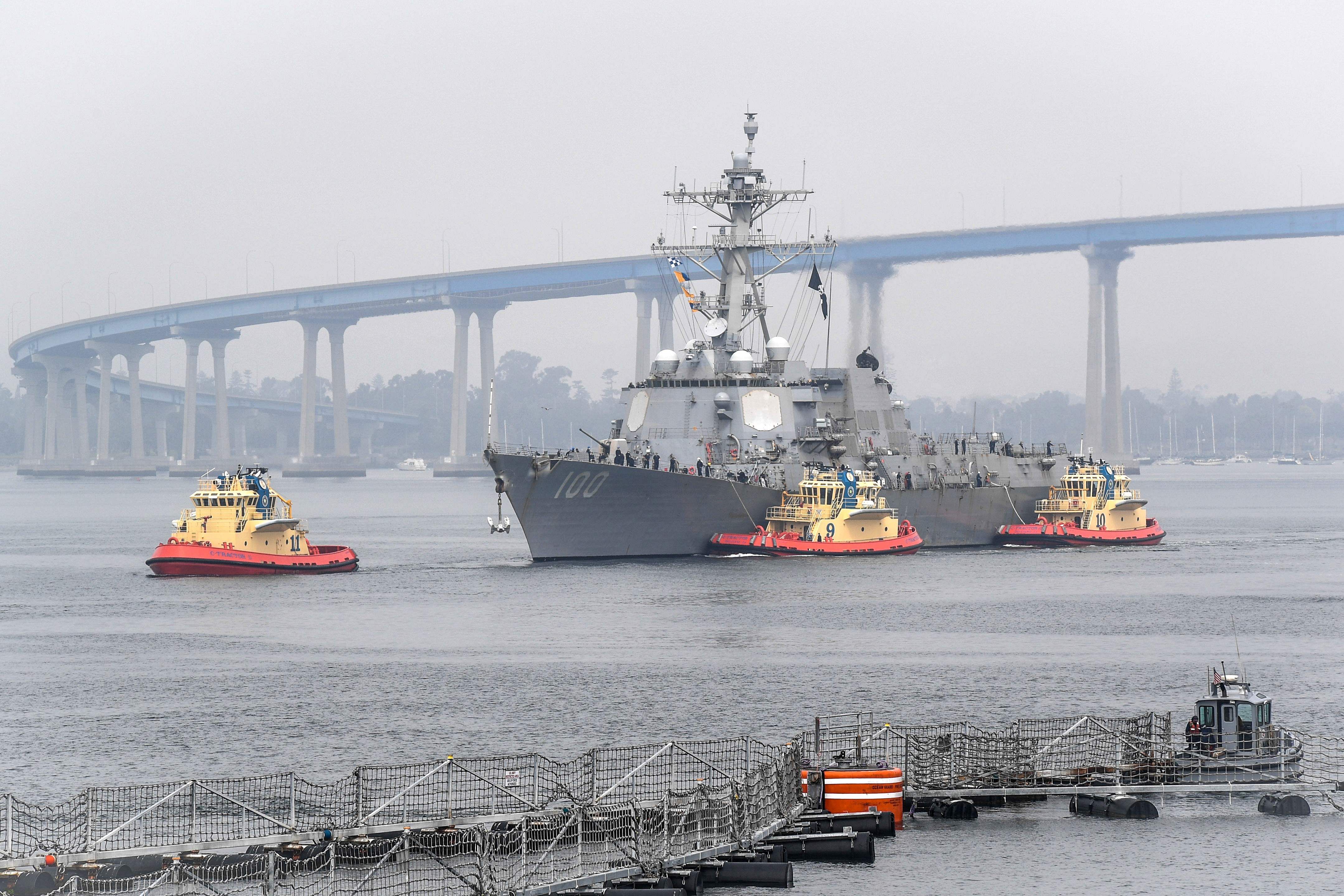 This handout photo released by the US Navy and taken on April 28, 2020 shows the guided-missile destroyer USS Kidd (DDG 100) arriving in San Diego as part of the Navy’s aggressive response to the COVID-19 outbreak on board the ship. (AFP)