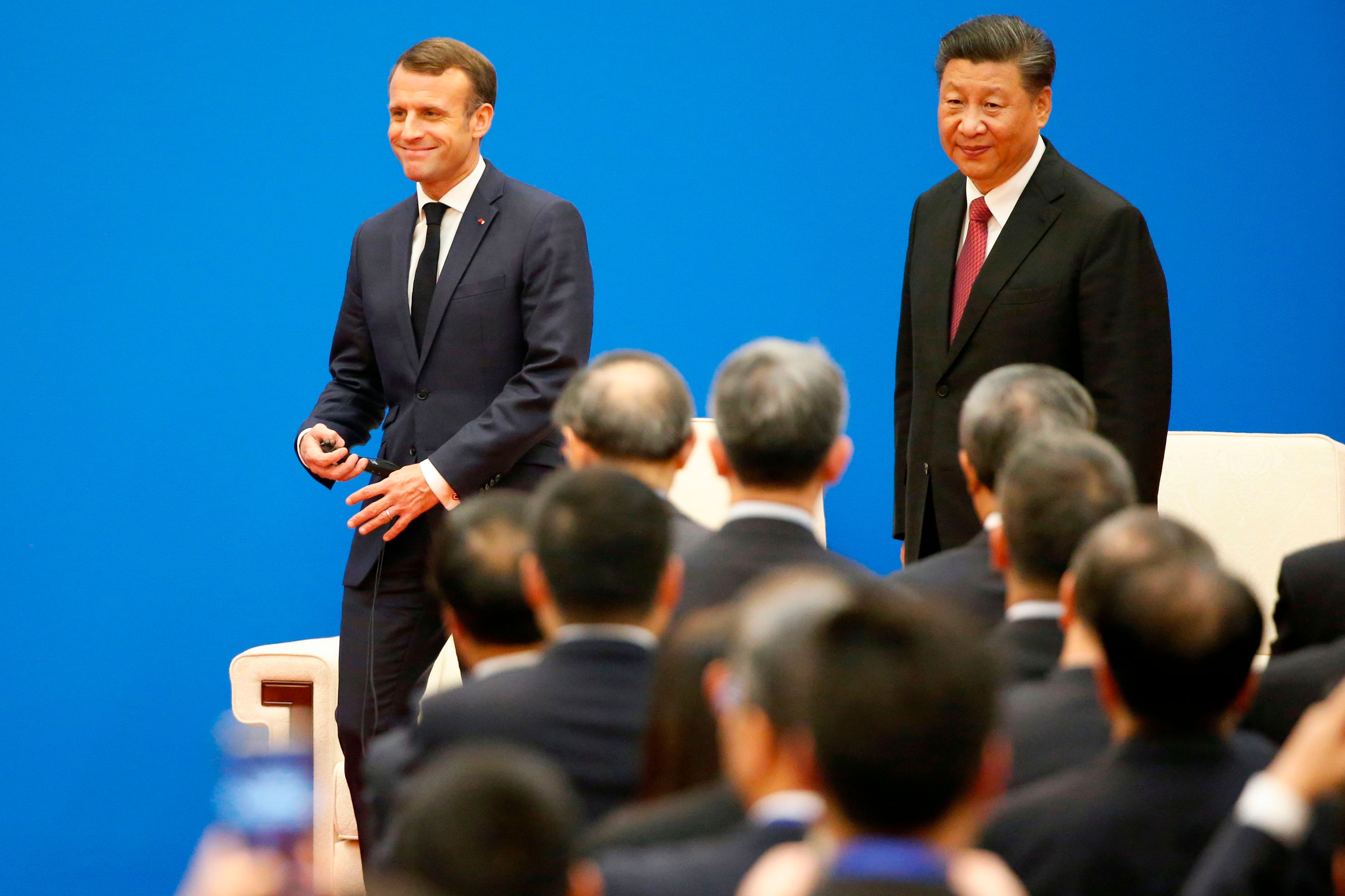 French President Emmanuel Macron and Chinese President Xi Jinping. (AFP Photo)