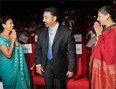 Union Minister Ambika Soni greets actors Kamal Haasan and Gauthami during the 'Retrospective of Kamal Haasan Films' held at Siri Fort Auditorium in New Delhi on Friday. PTI