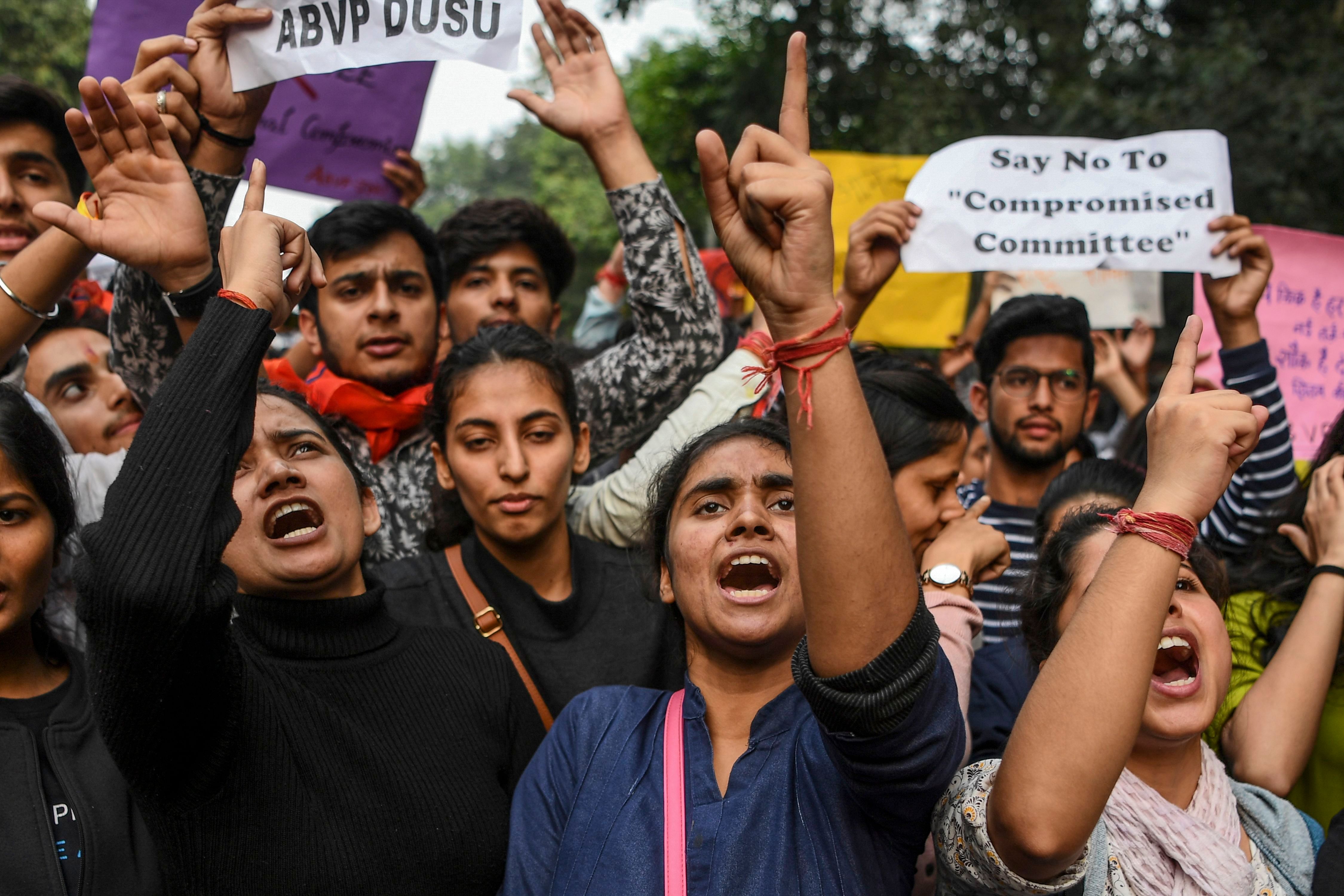 Student shout slogans and hold posters during a demonstration in support of Jawaharlal Nehru University (JNU) students for their ongoing protest against accommodation fee hike. (AFP Photo)