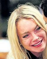 Lindsay Lohan cries after being sentenced on Tuesday. AP