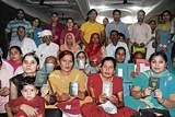 Hindu migrants from Pakistan in Jalandhar show their Pakistani passports. Photo by Anil Sharma