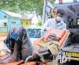 A beggar being brought to Isolation Hospital on Old Madras Road in Bangalore on Thursday. DH photo/ P Samson Victor