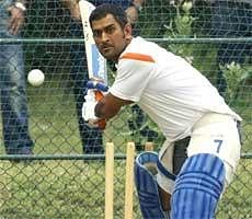 Indian captain Mahendra Singh Dhoni bats during a practice session in Dambulla on Tuesday