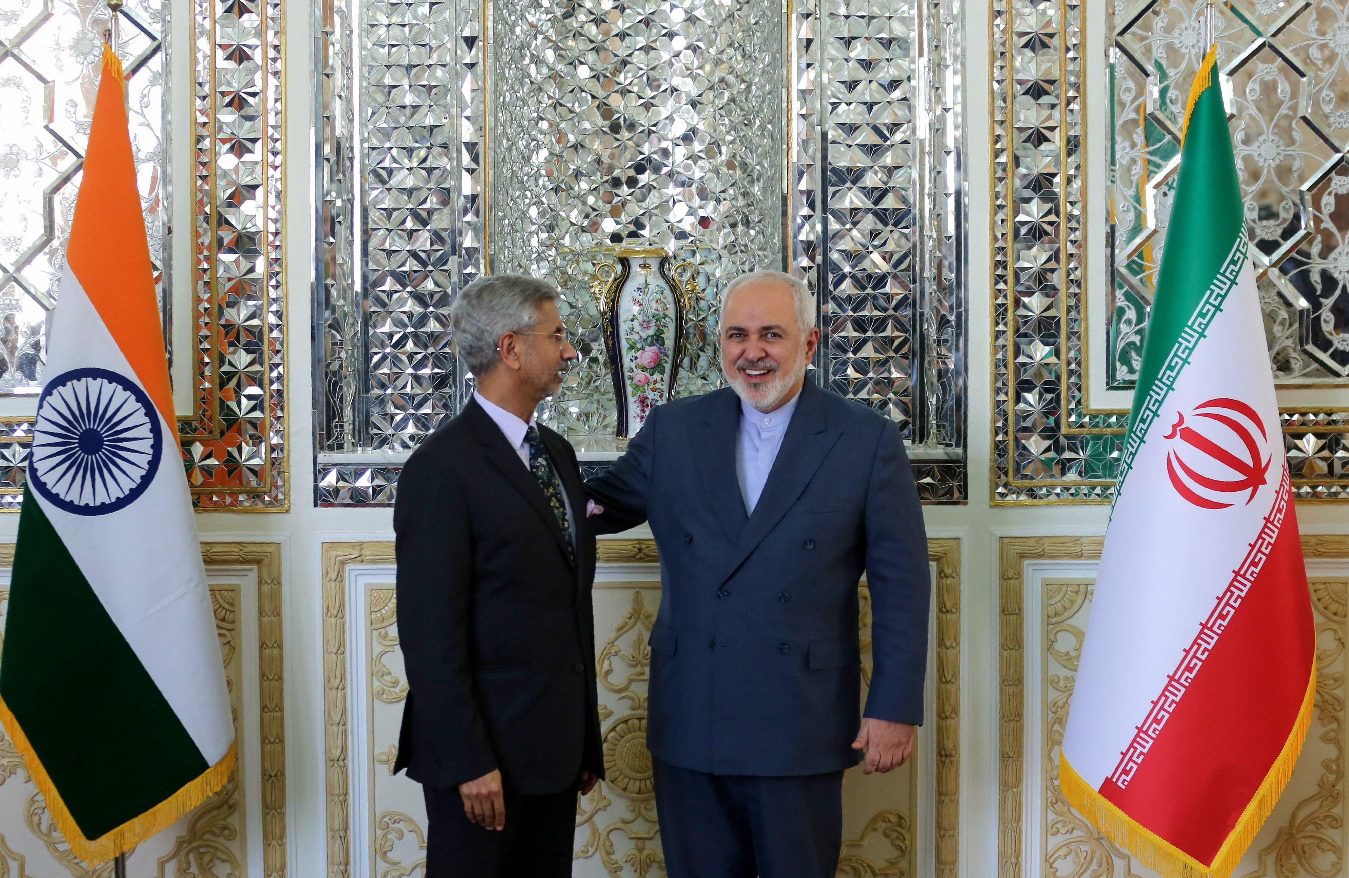 Iran's Foreign Minister Mohammad Javad Zarif (R) welcomes his Indian counterpart Subrahmanyam Jaishankar. (AFP Photo)