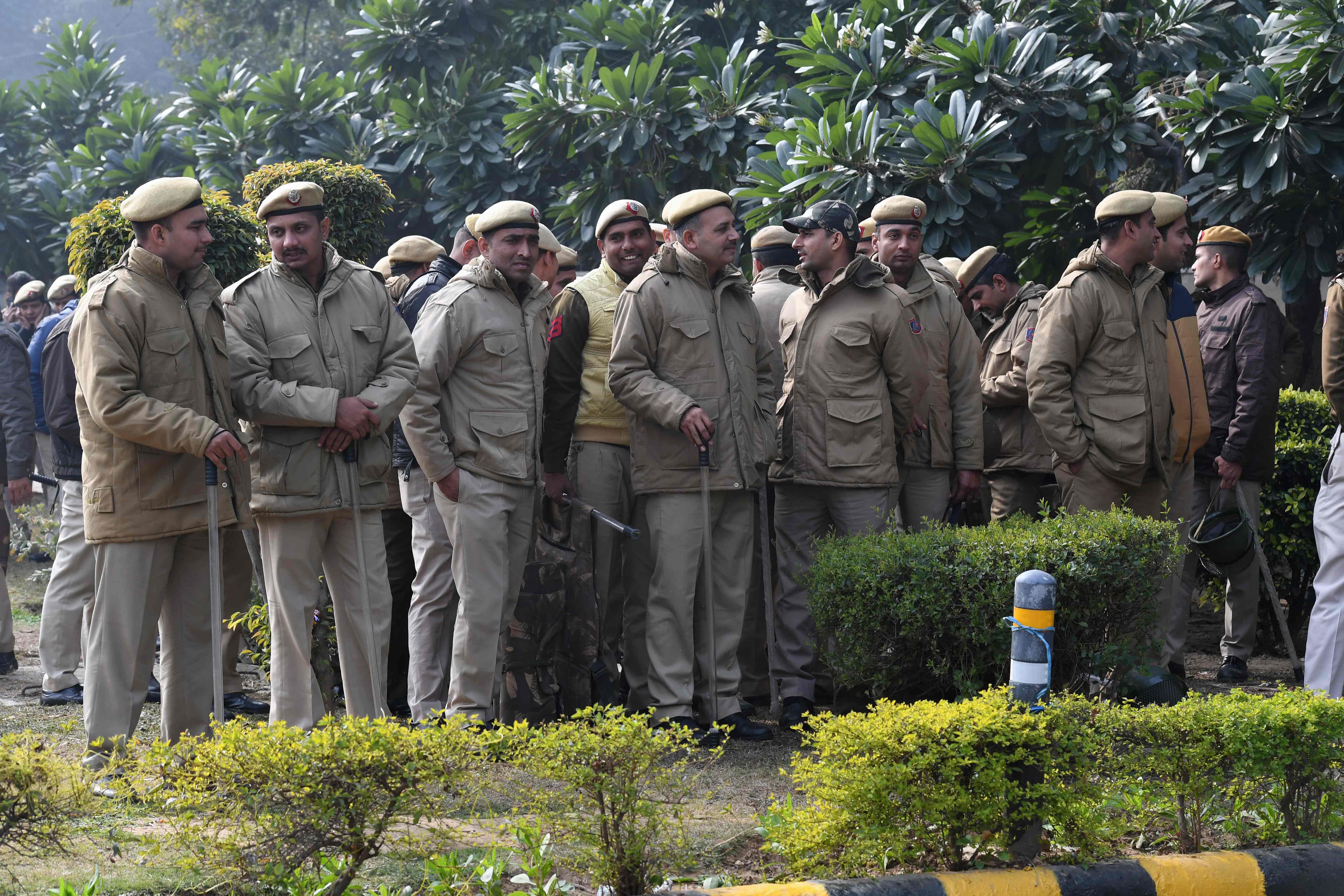 Police gather at a protest against India's new citizenship law in New Delhi. (PTI Photo)