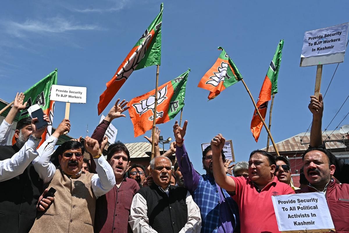 Members of the Indian Bharatiya Janata Party (BJP) take part in a protest to demand heightened security for party workers in Srinagar on May 7, 2019, in the wake of violence against political workers in state. (AFP)