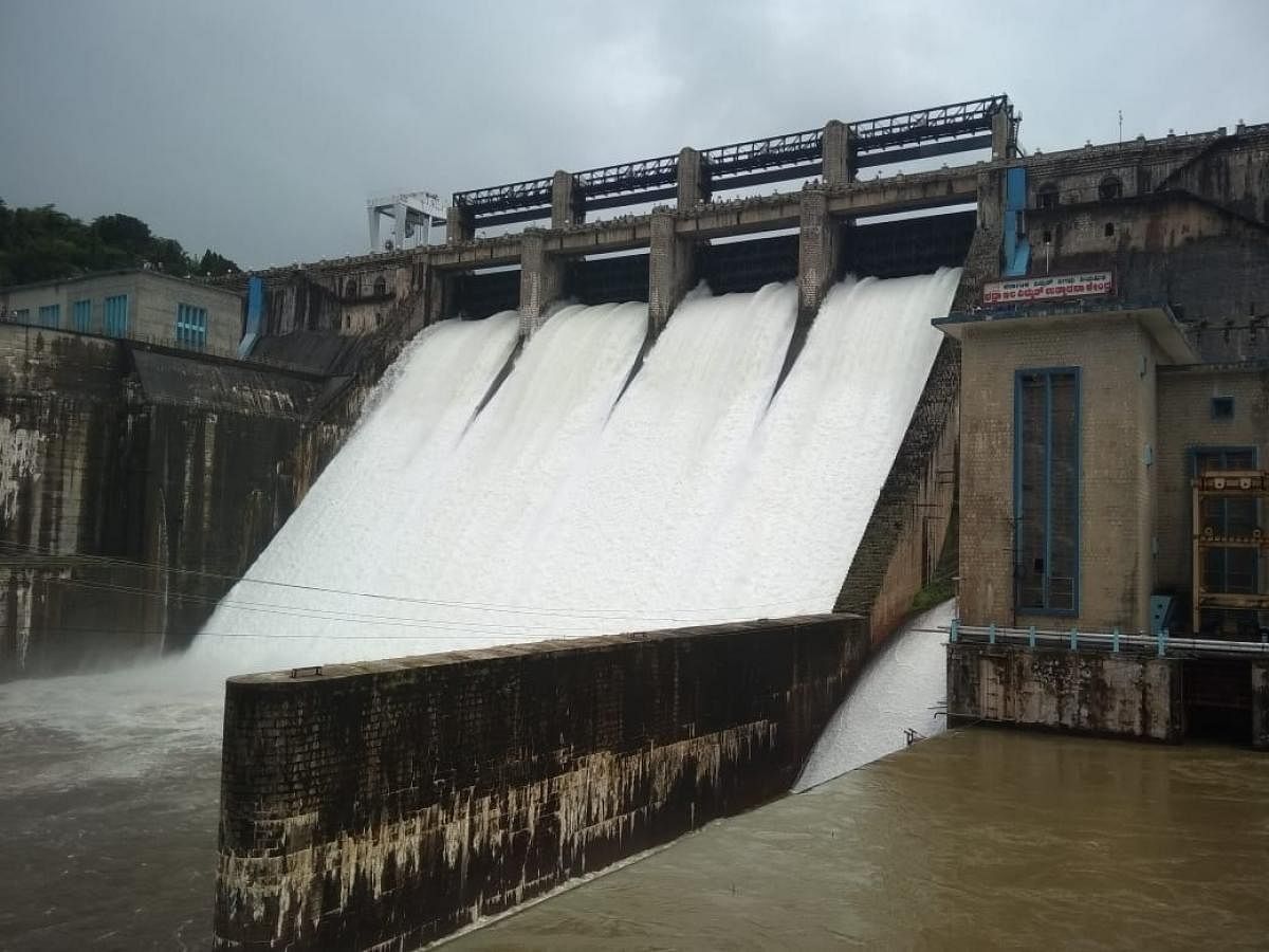 Water in Bhadra dam, situated at Lakkavalli in Tarikere taluk of Chikkamagaluru district was released on Tuesday, by opening four crest gates of the reservoir. (DH Photo)